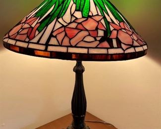BEAUTIFUL STAINED GLASS LAMP WITH LILY PADS ON BASE.                                                         $300.00