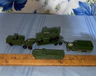 Military Trucks and Boat $20.00