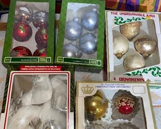 5 Boxes of Ornaments $10.00