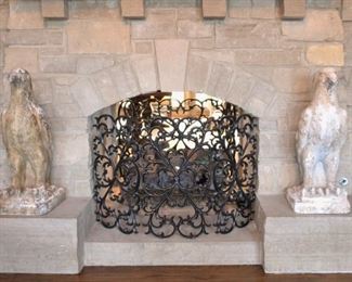 Eagle Statues                                                                                        Iron fireplace screen  not for sale/stays with house.                           Eagles are light weight.