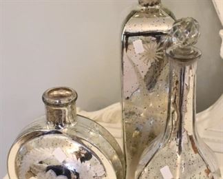 Mercury glass decorative decanters.