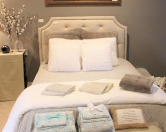 The headboard shown in this picture is not for sale.  All the bedding, pillows and queen size mattress and box springs set are all for sale.  Queen size Restoration Hardware bedding.