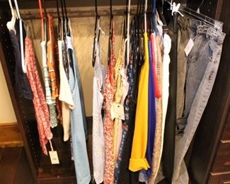 Many clothing items are new with tags.