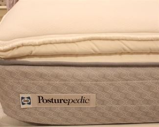 Posturepedic queen size mattress and box spring set.