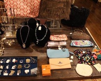 Tory Burch and Coach signature purses.