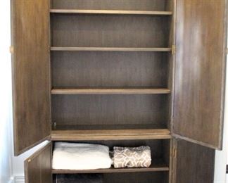 Mirrored Wardrobe/Cabinet  by Mr. Brown London.  Measures: 45 1/2" W x 17" D x 93" H.                                      Note: This cabinet is located at another home nearby. If interested, please talk to Jan to make an appointment to view this piece.