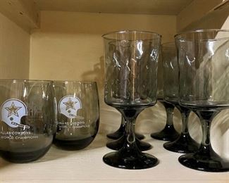 THE ONES ON THE LEFT ARE 1972 DALLAS COWBOWS WORLD CHAMPIONS TUMBLERS AND 6 WINE GLASSES.
