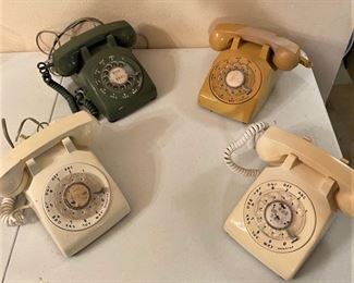 A GREAT SELECTION OF VINTAGE PHONE FROM ANOTHER TIME. WONDER IF ANY TEENAGERS WOULD KNOW HOW TO USE ONE OF THESE AND MAKE A CALL.