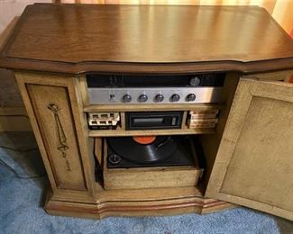 VINTAGE MAGNAVOX COMPACT HIFI STEREO SYSTEM WITH AM/FM STEREO, PHONOGRAPH AND 8 TRACK TAPE PLAYER. WE HAVE RECORDS AND 8 TRACK TAPES AVAILABLE TOO.