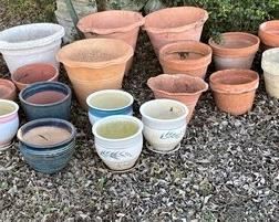 WE HAVE A LARGE COLLECTION OF PLANTERS POTS