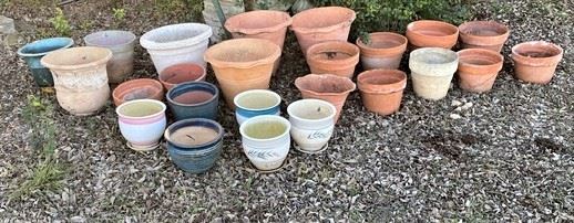 WE HAVE A LARGE COLLECTION OF PLANTERS POTS