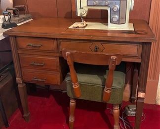 VINTAGE SEARS SEWING MACHINE IN CABINET.  SEWING CHAIR WITH STORAGE.