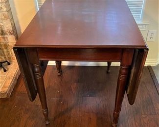 ANTIQUE 6-LEG DOUBLE DROP LEAF TABLE.