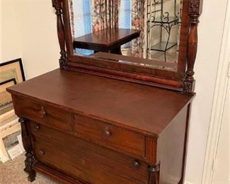 GORGEOUS ANTIQUE DRESSER AND MIRROR WITH CLAW FEET.