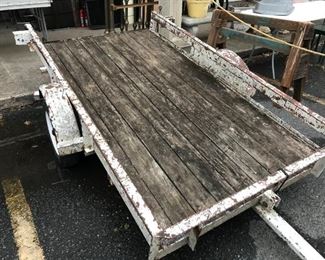 Utility trailer with dump bed