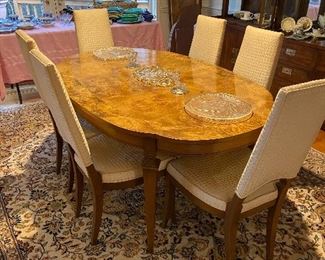 Gorgeous table. Comes with 2 leaves and pads.   Also 6 chairs immaculate 