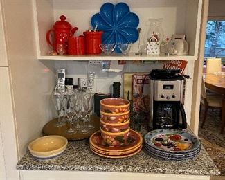 Lots and lots of kitchen, small appliances, pottery, dishes and glasses of all sorts…