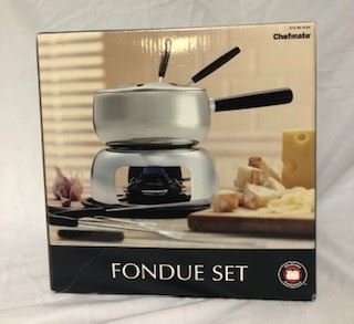 Brand new Chefmate Fondue set, still in box and bags, never opened. All parts included. If you like cheese and bread (or melted chocolate on anything at all... get this)
