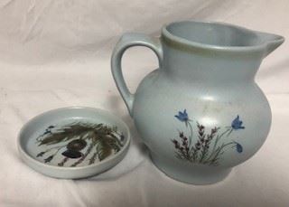 Small hand painted ceramic pitcher and plate stand. 
