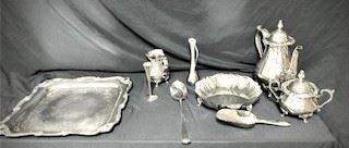 Various silver plated items, including two teapots, serving implements, vases, tray. 