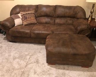 BROWN SOFA AND FOOT STOOL