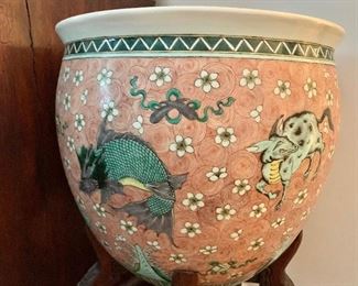 Pair of large Chinoiserie fish bowls on stands