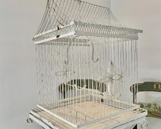 Vintage bird cage on stand