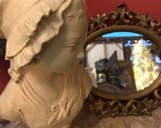 Bust of child (made in Italy):$269 and Antique oval mirror:$129