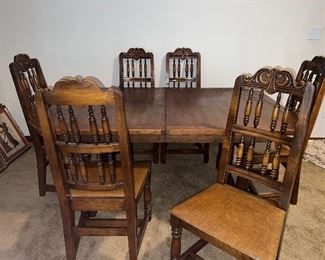 Solid table, 6 chairs and 2 leaves.  Price reflects Finish has condition issues. 