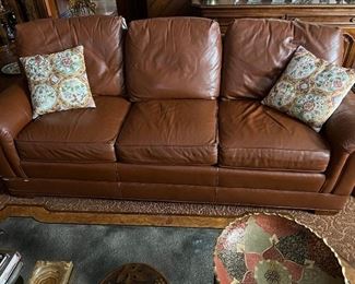 One of a pair of Fine Charles Ray Leather Sofas.  