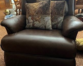 Leather Recliner. 
Needlepoint pillows