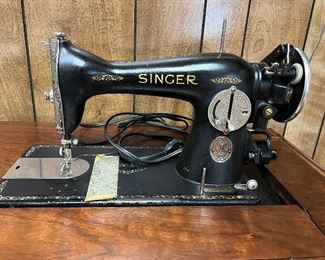 Vintage Singer Machine in sewing stand