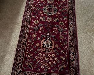57.5" by 27 Persian rug