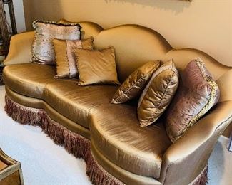 * $1,200
CUSTOM MADE COPPER SILK SOFA WITH TASSELS AND DECORATIVE PILLOWS 
97”W x 45”D x 38”