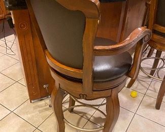 $250 SET
4 LEATHER AND WOOD BARSTOOLS -SOLD AS IS
21”DIA x 46”H 