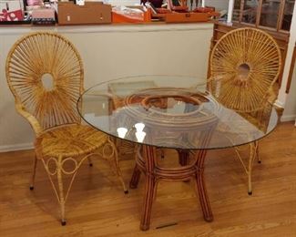 rattan glass top table and two chairs