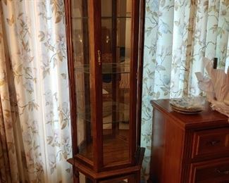 mirrored lighted curio cabinet