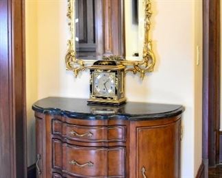 marble-top chest, clock, mirror