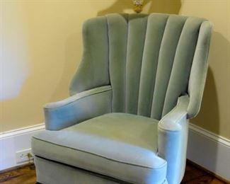 claw-footed, scallop-back upholstered chair