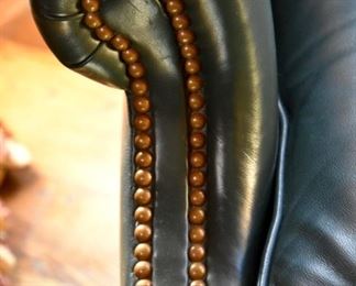 leather tufted chair and ottoman (arm detail)