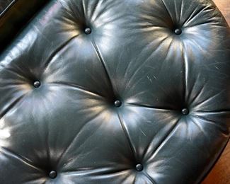 leather tufted chair and ottoman (detail)