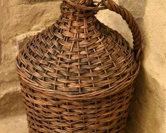 large wicker covered wine jug