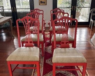 6 coral,factory painted Chippendale style chairs. Two arm chairs.