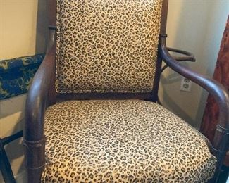 French Empire period arm chair with very modern animal print upholstery.