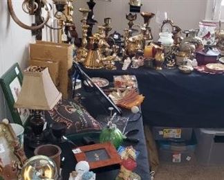 Tables almost full of Brass decor