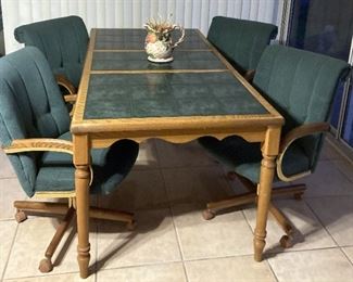 TILE TOP TABLE AND 4 ROLLING CHAIRS