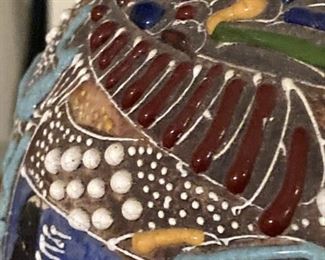 CLOSEUP OF THE RAISED ORNAMENTATION. ALL HAND APPLIED. (Just imagine the amount of labor required!!)