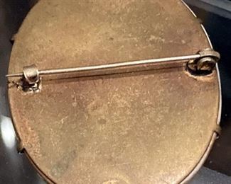 BACK SIDE OF THE BROOCH
