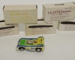 1031	LOT OF 10 SLOTCARS TCR JAM CARS IN BOXES
