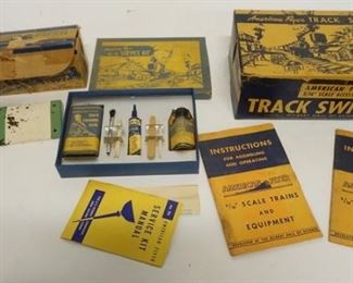 1110	AMERICAN FLYER TRAIN LOT, TRACK SWITCHES, BOOKS, #26 SERVICE KIT & CROSSING GATE
